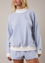 Load image into Gallery viewer, Light blue and white striped sweater and shorts set on a neutral background