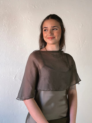 SUNDAY EDITION BY LE LIS boat neck cape slip midi dress in black, featuring a stylish boat neckline and flowing silhouette.