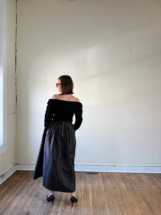 Brown animal print brocade pleated midi skirt by Flying Tomato, showcasing a flowing, patterned skirt with pleats.
