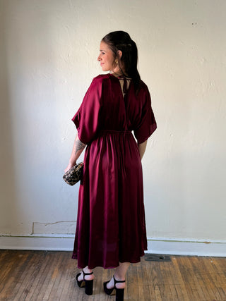 Maroon satin kimono sleeve midi dress by SUNDAY EDITION BY LE LIS, featuring elegant flowing fabric and stylish kimono sleeves.