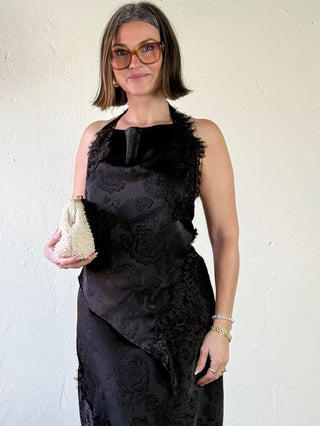 VERO MODA Kira Lace Halter Top in SSLV style, featuring intricate lace details and a halter neckline on a mannequin.