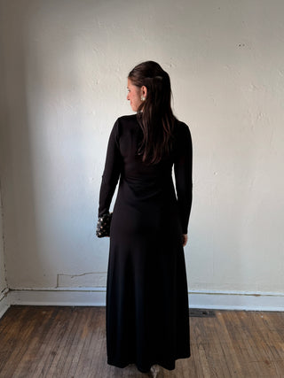 Stevie Jane After Dark Ruched Maxi Dress in black, featuring a fitted bodice and flowing skirt, elegant evening wear.