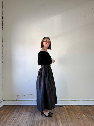 Flying Tomato animal print brocade pleated midi skirt in brown, showcasing the textured fabric and stylish design.