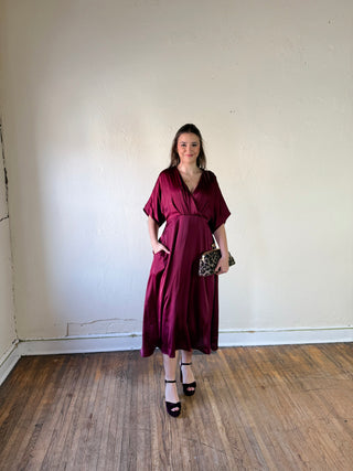 Maroon satin kimono sleeve midi dress by SUNDAY EDITION BY LE LIS, shown with flowing fabric and elegant design.