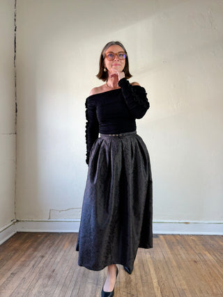 Flying Tomato animal print brocade pleated midi skirt in brown featuring a stylish, flowing design and sophisticated pattern.