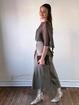 SUNDAY EDITION BY LE LIS Boat Neck Cape Slip Midi Dress in elegant black with a flowing cape detail and midi length.