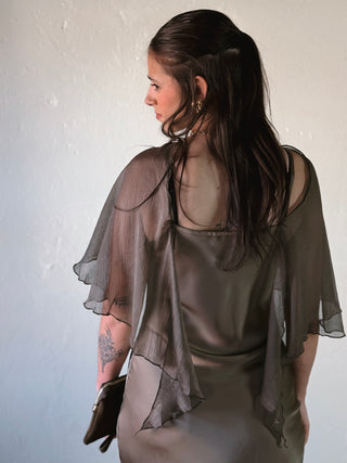 SUNDAY EDITION BY LE LIS boat neck cape slip midi dress in black, featuring a flowing cape detail and elegant midi length.