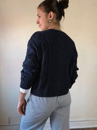 Buttermelon Heritage Cable Knit Cardigan in cozy cable knit, featuring a classic design and button closure.