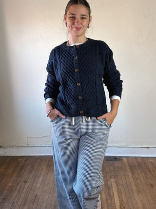 Buttermelon Heritage Cable Knit Cardigan, cozy knit sweater with cable pattern, in classic style, shown in natural light.