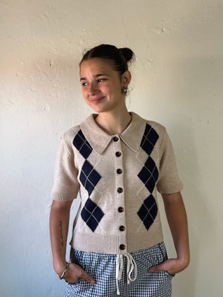 Entro Prep School Argyle short sleeve cardigan in navy and green, featuring classic argyle pattern and button front.