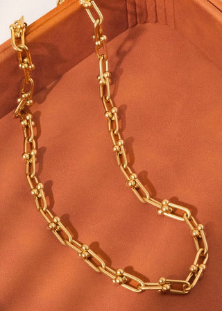 18K gold bold chain necklace by FLÂNERIE BY MAIQ, featuring a chunky, stylish design for a statement jewelry look.
