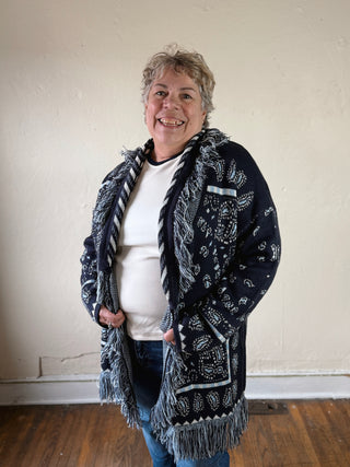 MABLE bandana fringe longline cardigan with open front and long sleeves, featuring decorative fringe details.