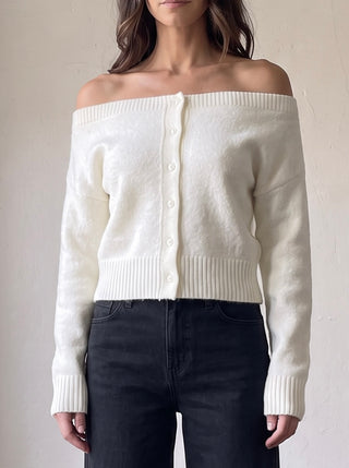 MABLE soft focus off-shoulder cardigan in light fabric, styled with a relaxed fit and feminine design.