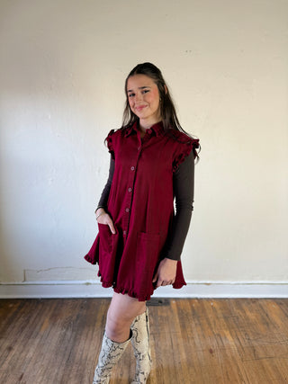 OLIVACEOUS Willow ruffle hem shirt dress from DMIN with button front and lightweight fabric, styled with a belt and rolled sleeves.