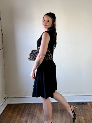 She + Sky DMIN sleeveless flare sweater dress in soft knit fabric, styled with a relaxed fit and stylish flare hem.