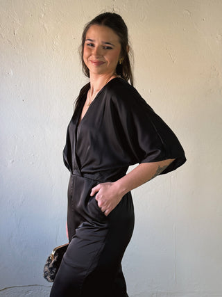 Black satin kimono sleeve jumpsuit by Sunday Edition by Le Lis, featuring a stylish, flowing design with elegant kimono sleeves.