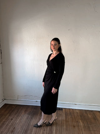 Black Surplice Wrap Long Sleeve Midi Dress by Sunday Edition by Le Lis, showing the elegant front view and fitted waist.