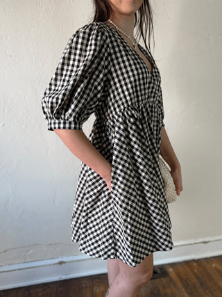 MOD REF Aileen Gingham Babydoll Dress in DMIN, featuring a flowy silhouette with gingham pattern and delicate details.