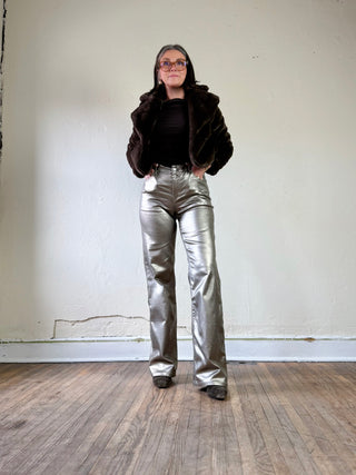 Gold metallic coated high waist straight leg pants by Molly Bracken, shown in a close-up of the fabric and fit.