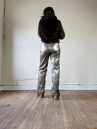 Gold metallic coated high waist straight-leg pants by Molly Bracken displayed on a model.