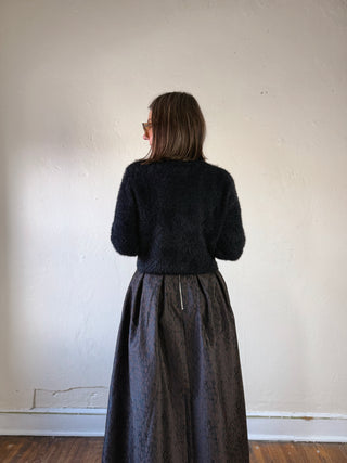 Black fuzzy pearl button cropped cardigan by FLYING TOMATO, featuring a cozy texture and pearl button details.