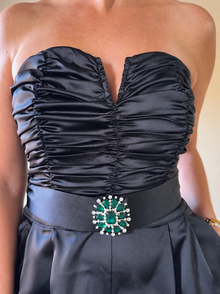 Black strapless satin wide-leg jumpsuit by Flying Tomato, featuring a sleek design and flowing fabric for elegant style.