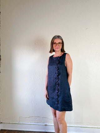MABLE Margot scalloped linen mini dress with a fitted bodice and flared skirt, featuring scalloped hem detailing.