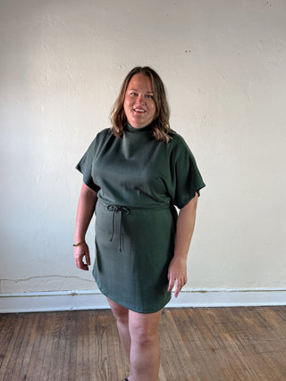 SUNDAY EDITION BY LE LIS Mock Neck Drawstring Waist Mini Dress, black with long sleeves and casual fit, front view.