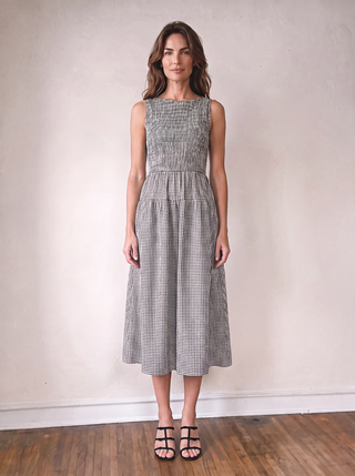 Black checked gingham midi dress by BLU PEPPER, featuring a stylish and classic design, shown on a model.