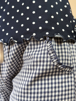 Pink Dotty Mock Neck Top from SUNDAY EDITION BY LE LIS, featuring a stylish mock neck and playful dot pattern.