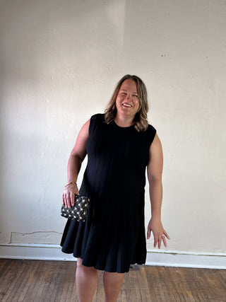 SHE + SKY extended size sleeveless flare sweater dress in a soft knit silhouette