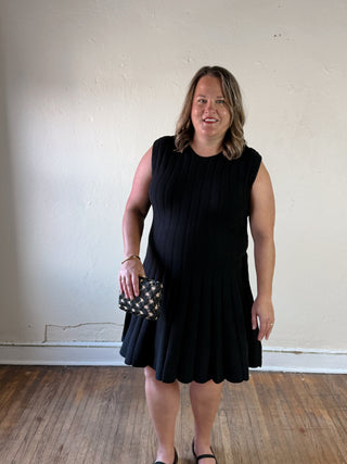 SHE + SKY extended size sleeveless flare sweater dress in a relaxed silhouette
