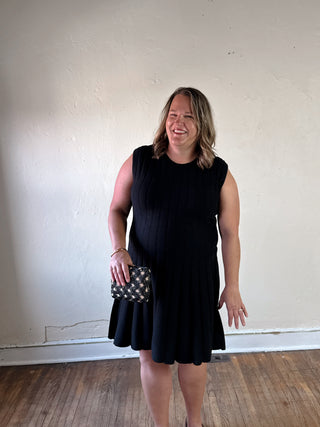 SHE + SKY extended size sleeveless flare sweater dress in a soft knit silhouette