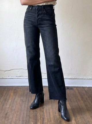 Just Black Denim women's slim palazzo jeans with scissor cut details in black denim fabric, showcasing the stylish design and fit.