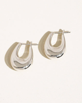 Silver Quinn 18K classic droplet hoop earring by FLÂNERIE BY MAIQ, showcasing a sleek, elegant hoop design for pierced ears.