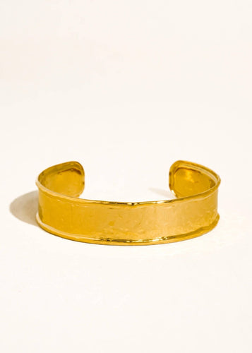 Gold bracelet on a white background