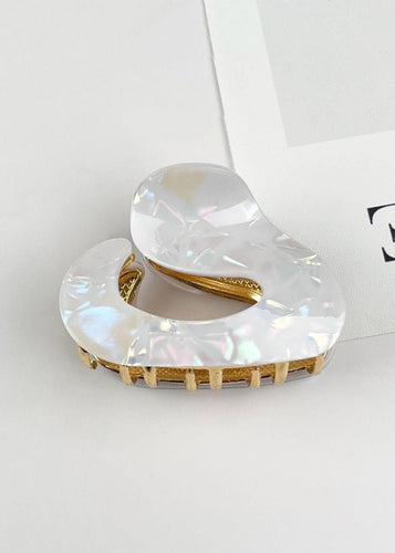 Clear crystal hair clip on a white background