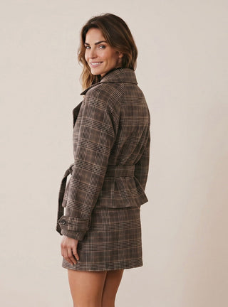 SKIES ARE BLUE Cambridge Plaid Short Trench Jacket with double-breasted design and classic plaid pattern, displayed on a hanger