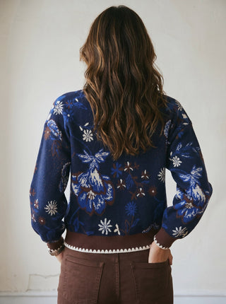 SKIES ARE BLUE Midnight Bloom Intarsia Cardigan, cozy knit sweater with floral pattern in dark and vibrant hues.