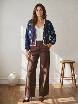 Skies Are Blue Midnight Bloom intarsia cardigan in dark knit with floral pattern, button-front design, and long sleeves.
