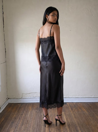 BLU PEPPER After Dark Satin Lace Cami in black with delicate lace trim, made from smooth satin fabric.