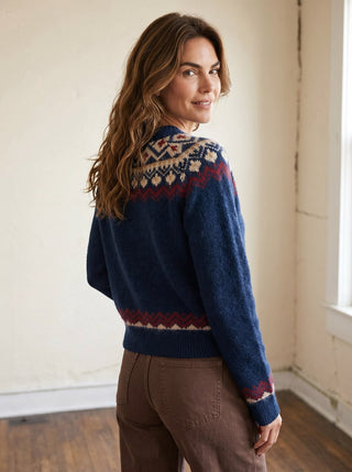 BLU PEPPER Nordic Heritage Fair Isle cardigan, cozy knit with traditional geometric patterns, displayed on a hanger.