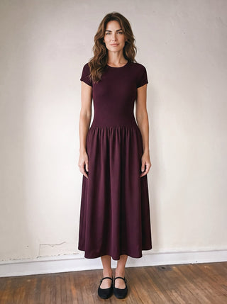 SUNDAY EDITION BY LE LIS After Hours Knit Mix Midi Dress in dark color, styled with a relaxed fit and textured knit fabric.