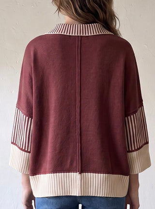SHE + SKY varsity stripe collar sweater top in gray with white and navy stripes, featuring a classic crew neckline and cozy knit fabric.