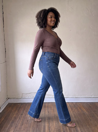 RISEN PBOT extended size comfort sculpt high-rise flare jeans, light wash denim with fitted high waist and flared leg style.