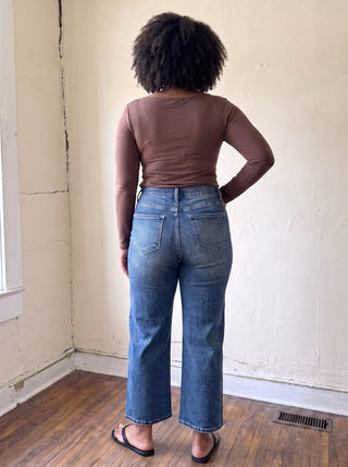 RISEN PBOT high rise crop wide-leg jeans in extended size, showcasing a light wash denim with a relaxed fit and wide leg silhouette.