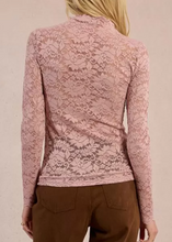 Load image into Gallery viewer, Person wearing a pink lace long-sleeve top against a beige background
