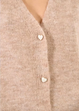 Load image into Gallery viewer, Close-up of a beige cardigan with heart-shaped buttons.
