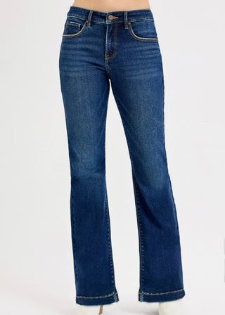 tummy control id rise flare jean dark wash with white background 
