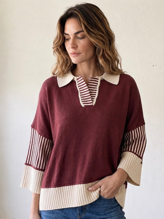 SHE + SKY varsity stripe collar sweater top featuring a classic design with colorful stripes and a cozy fit.